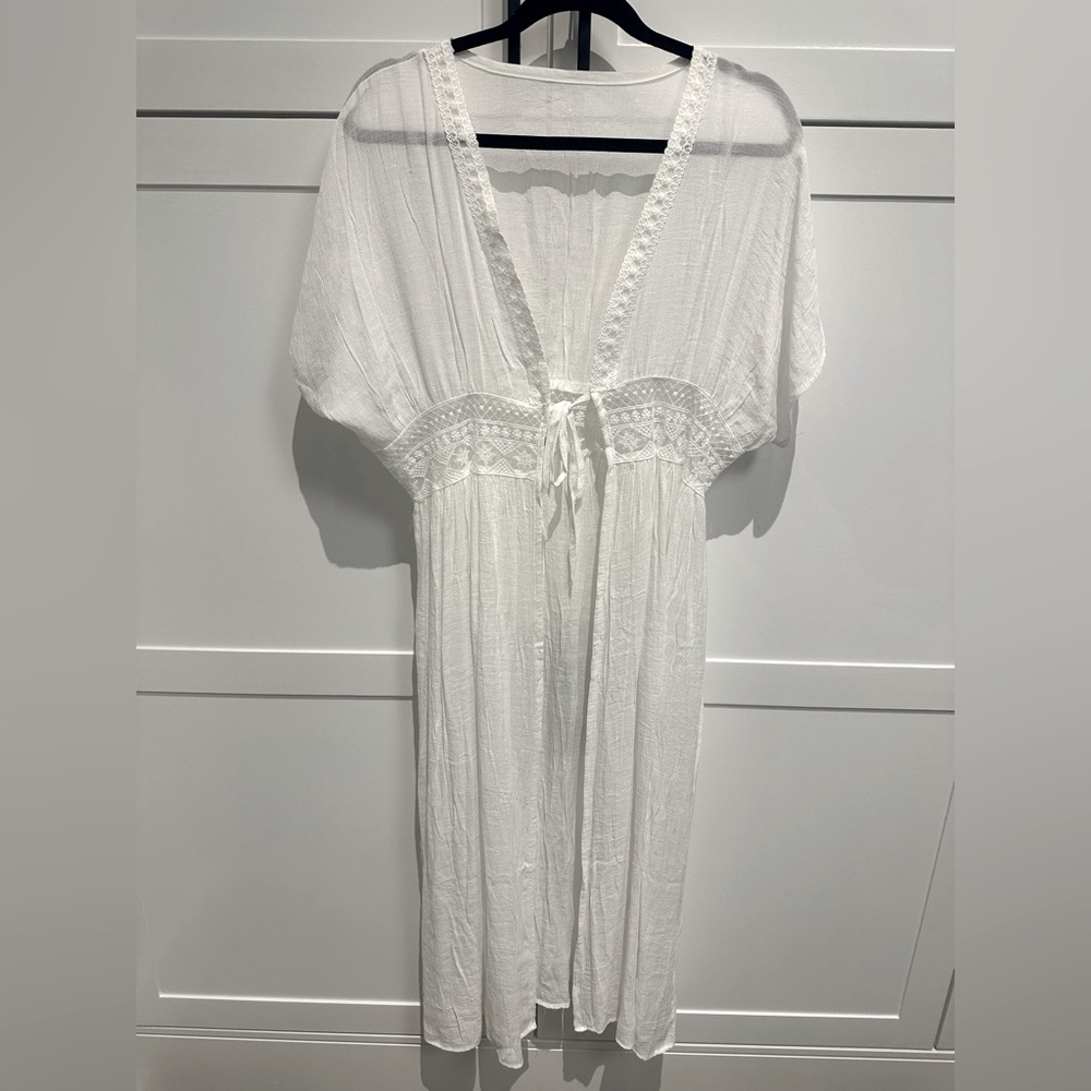 Elegant white bikini/ swimsuit coverup.   New condition no tags